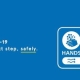 Blue COVID-19 NHS sign: "Hands, Face, Space, Fresh Air" with icons and safety message from UK government.